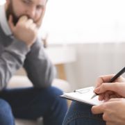 Overcoming Barriers and Recognizing the Unique Value of Including Peer Support Specialists with Prior Justice Involvement in Recovery